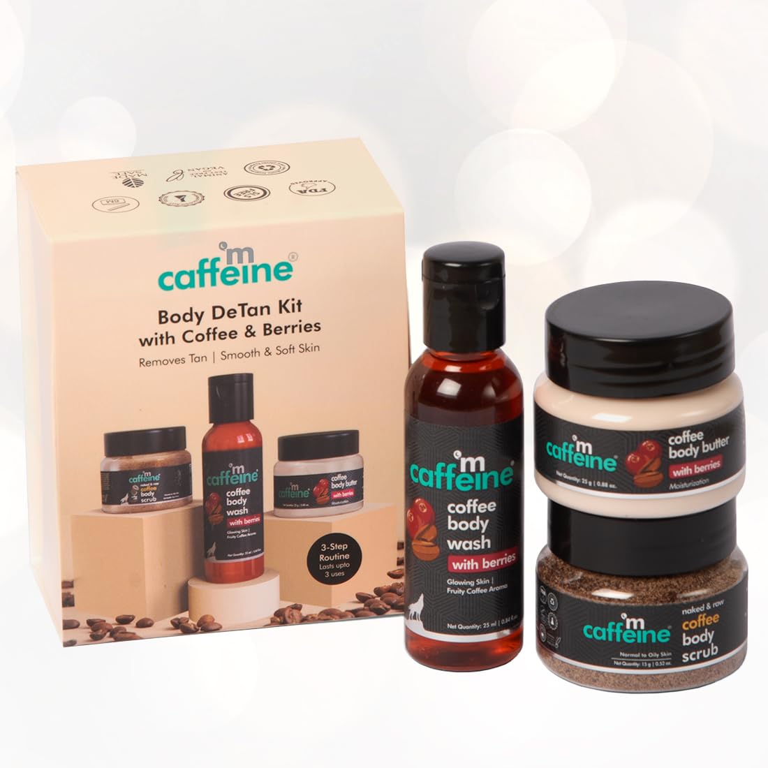Caffeine body care product set including body wash, scrub, and lotion with packaging on a white background.