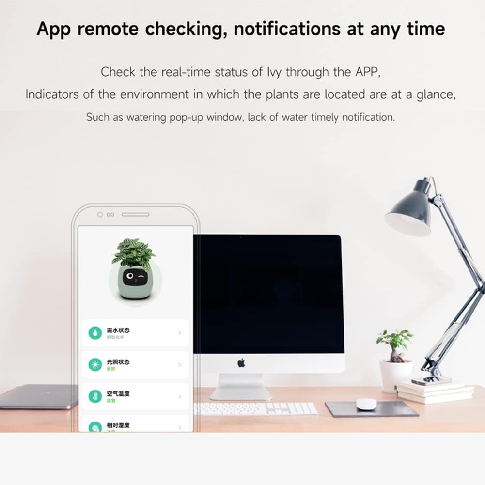 Smart plant monitor app displayed on a smartphone with a computer and desk setup.