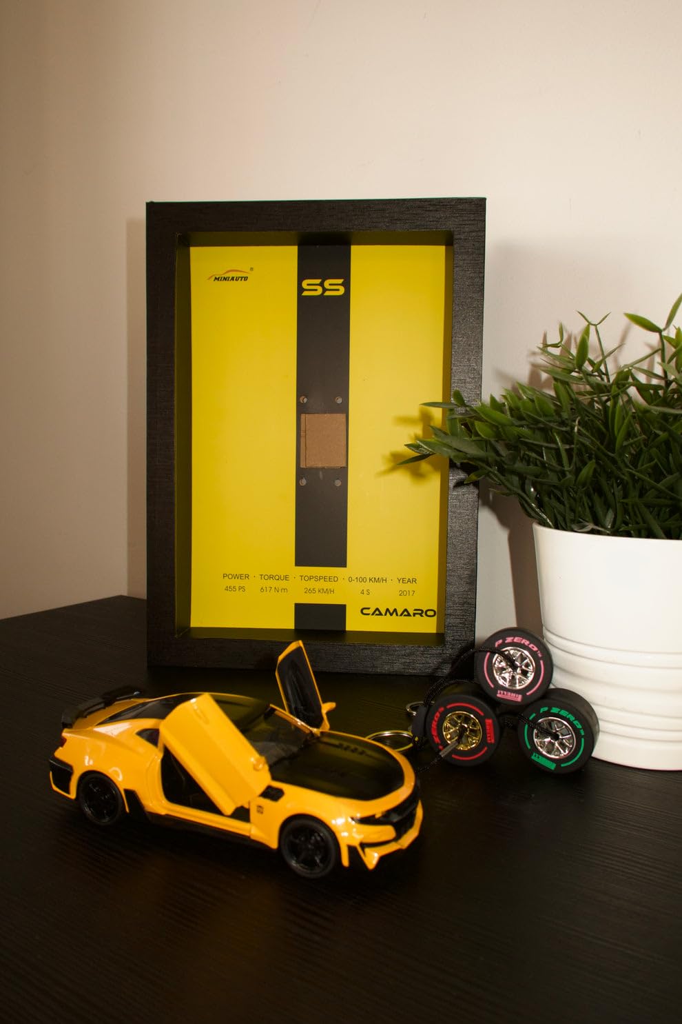 Die-cast car collection display wall art with removable cars