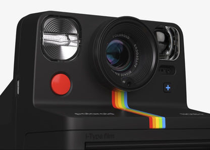 Black camera with features listed on a white background