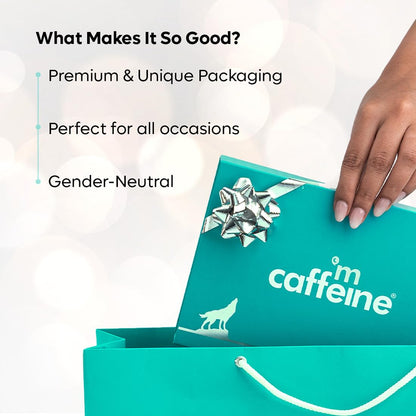 Turquoise gift box with 'caffé m caffeine' branding, held by a hand, on a white background.