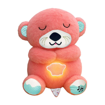 Pink plush toy with a glowing belly on a white background