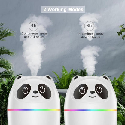 Two panda-shaped humidifiers with steam rising from them, set against a natural background.