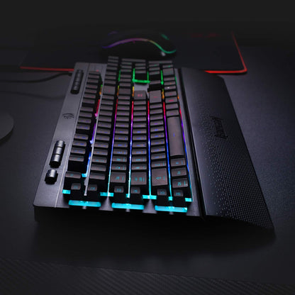 Gaming keyboard with RGB lighting on a dark surface